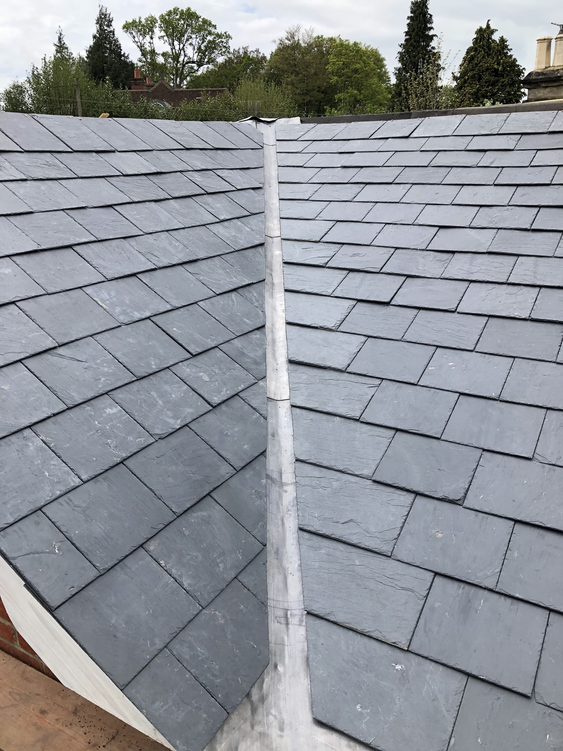 New slate roof with lead valley