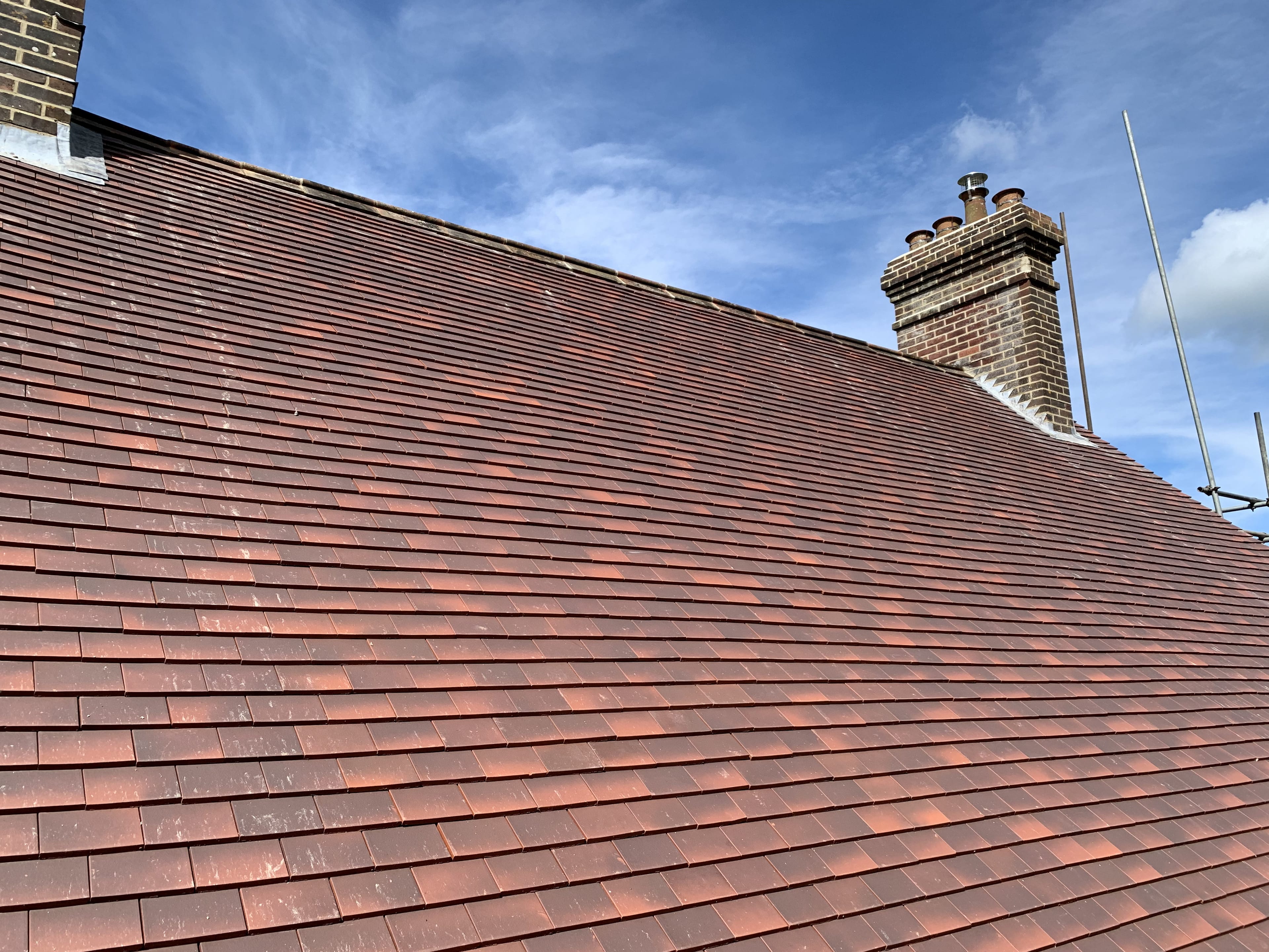 Completed clay plain tile reroof